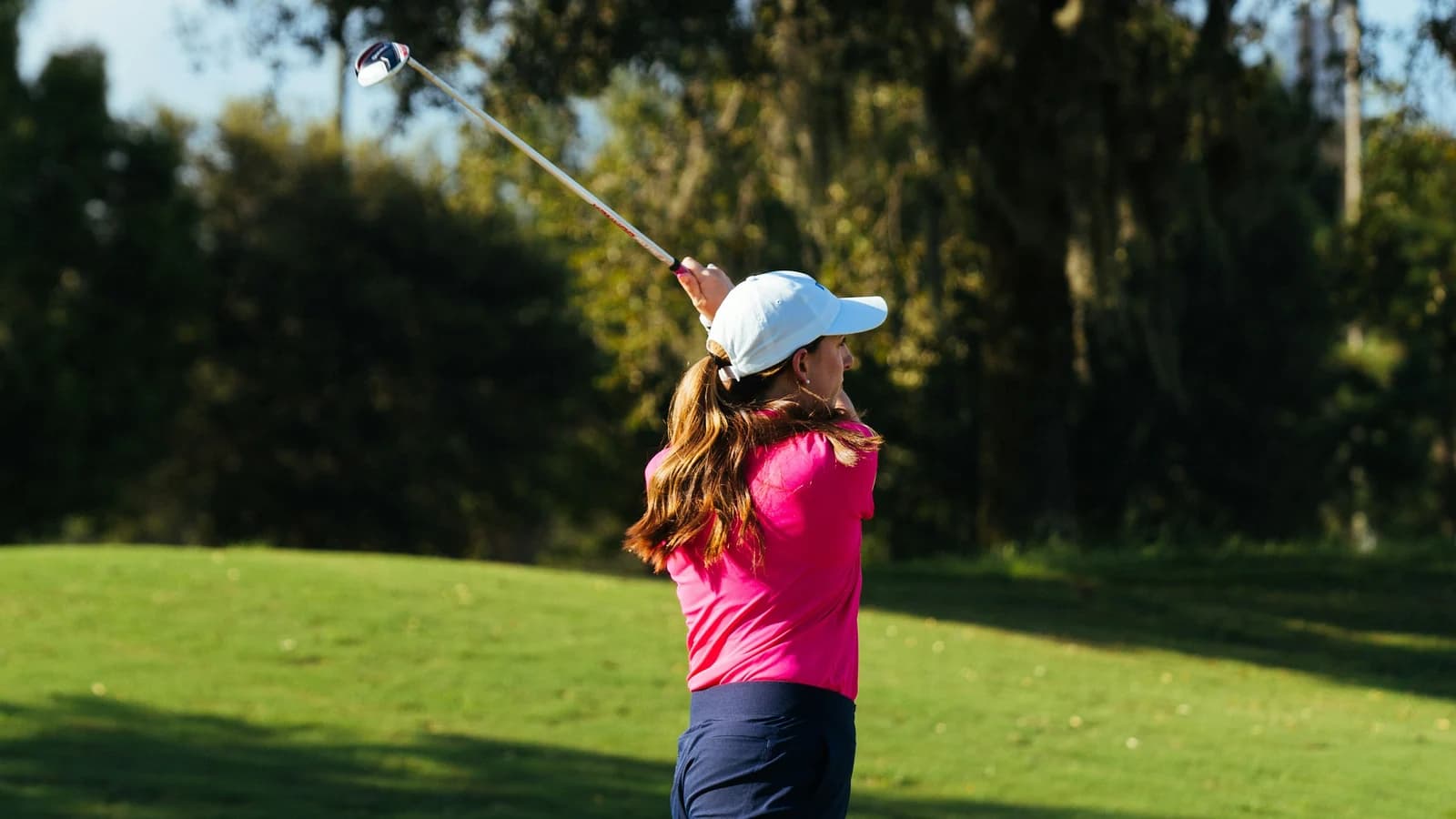 Golfer wearing a cap and polo shirt during a round